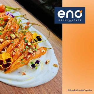 Honey-glazed carrots with yogurt sauce and roasted hazelnuts