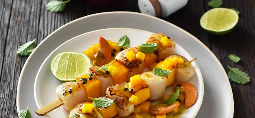 Grilled mango and passion fruit scallops skewers