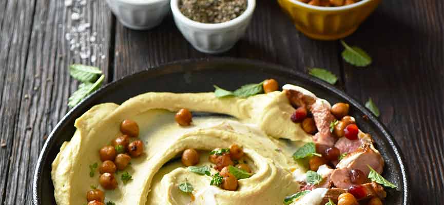 Harissa and hummus leg of lamb